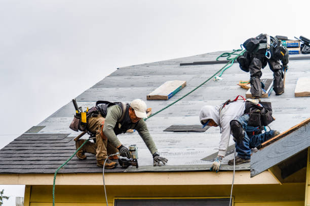 Professional Gutter Installation technician working in Julian, WV